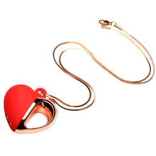 Stimulator clitoris CHARMED Heart Necklace, pandantiv în formă de inimă pe colier, 10 funcții de vibrație, roșu cu auriu