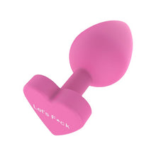 Plug anal TOYJOY Anal Play Booty Sweethearts, cu mesaj „Let’s Fuck” pe baza în formă de inimă, diametru 3.5 cm, roz