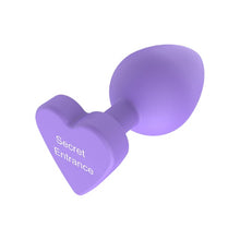Plug anal TOYJOY Anal Play Booty Sweethearts, cu mesaj „Secret Entrance” pe baza în formă de inimă, diametru 3.5 cm, mov