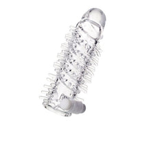 Manșon A-TOYS Fril, cu mini vibrator, pentru extensia și îngroșarea penisului, texturat, cu striații, transparent, 13.4 cm