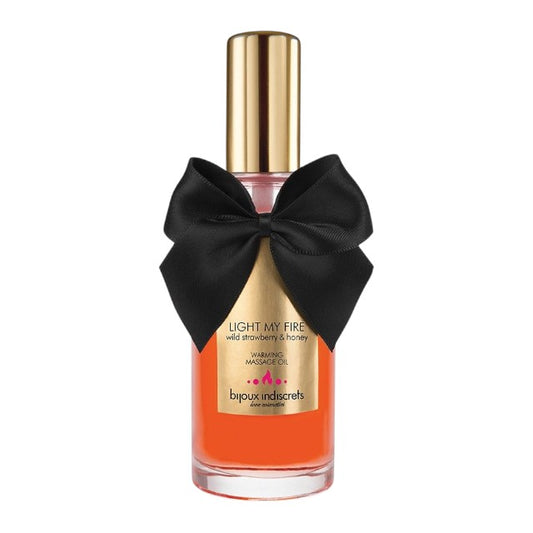 Ulei de masaj BIJOUX INDISCRETS Light My Fire Wild Strawberry, cu efect de încălzire, aromă de căpșuni și miere, 100 ml
