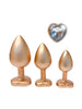 Set plug anal DREAMTOYS Pearl Gold Plug, 3 dopuri de dimensiuni progresive, 7.1 cm - 9.5 cm, cu baze în formă de inimă, auriu