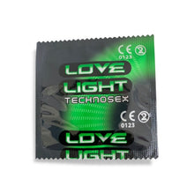 Prezervative LOVE LIGHT TECHNOSEX Glow, din latex, lubrifiate, fosforescente, diametru 52 mm, 12 buc