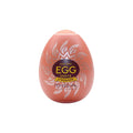Ou masturbator TENGA Shiny II, de unică folosință, cu loțiune inclusă, interior texturat geometric, material elastic TPE