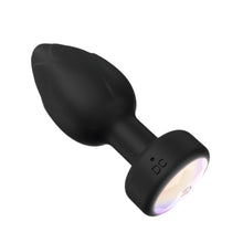 Vibrator anal TOOSH Light Up Vibrating Butt Plug, cu telecomandă, led multicolor, 10 funcții de vibrație, din silicon, 7.6 cm inserabili, negru