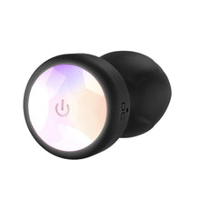Vibrator anal TOOSH Light Up Vibrating Butt Plug, cu telecomandă, led multicolor, 10 funcții de vibrație, din silicon, 7.6 cm inserabili, negru